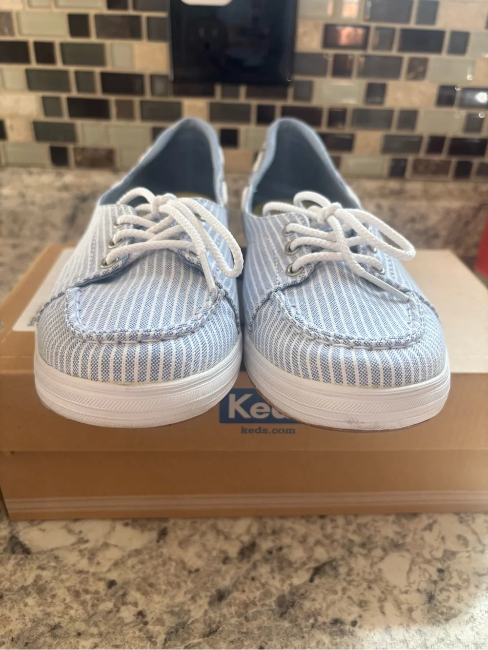 Keds lace up boat style shoe